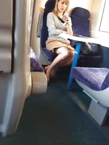 9P Candid blonde on train shows legs and upskirt