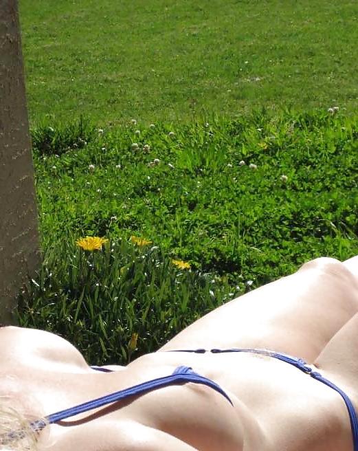 9P N. C. - Sunbath in minikini and hot pants