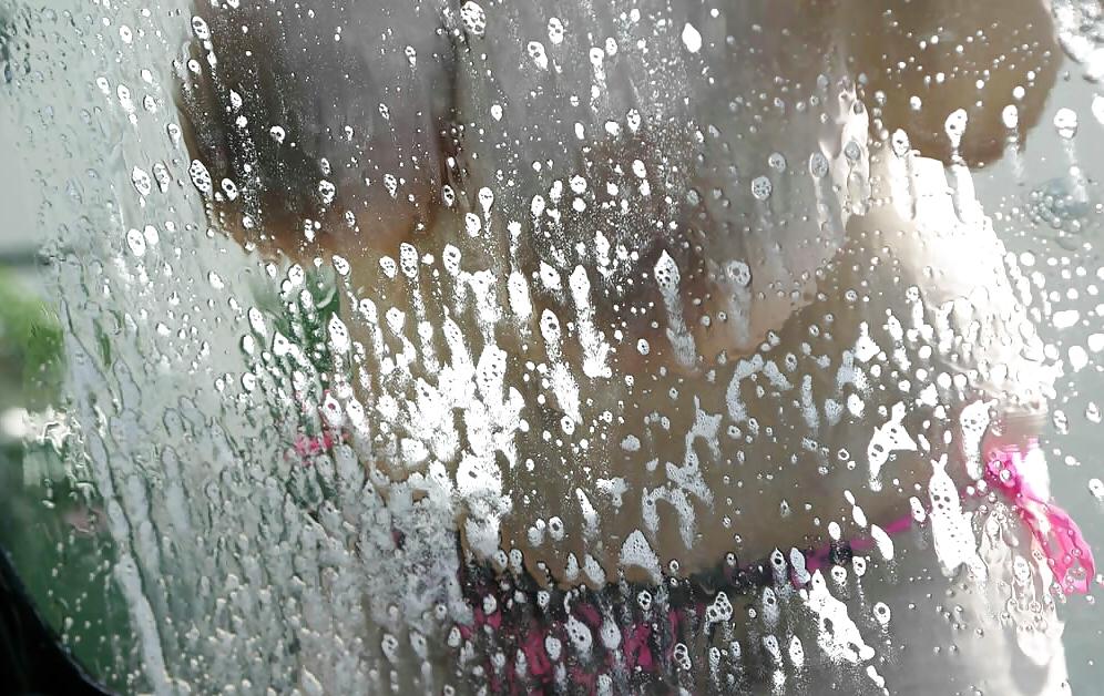 9P Denise Davies strips off her bikini while washing a car