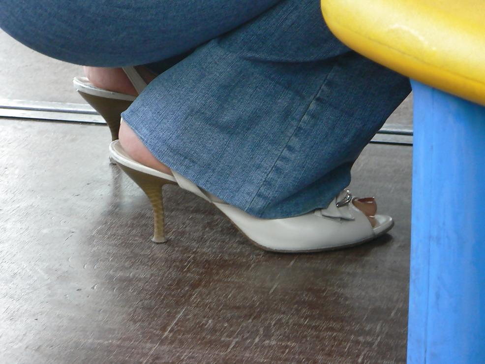 18P Feet and heels on the street