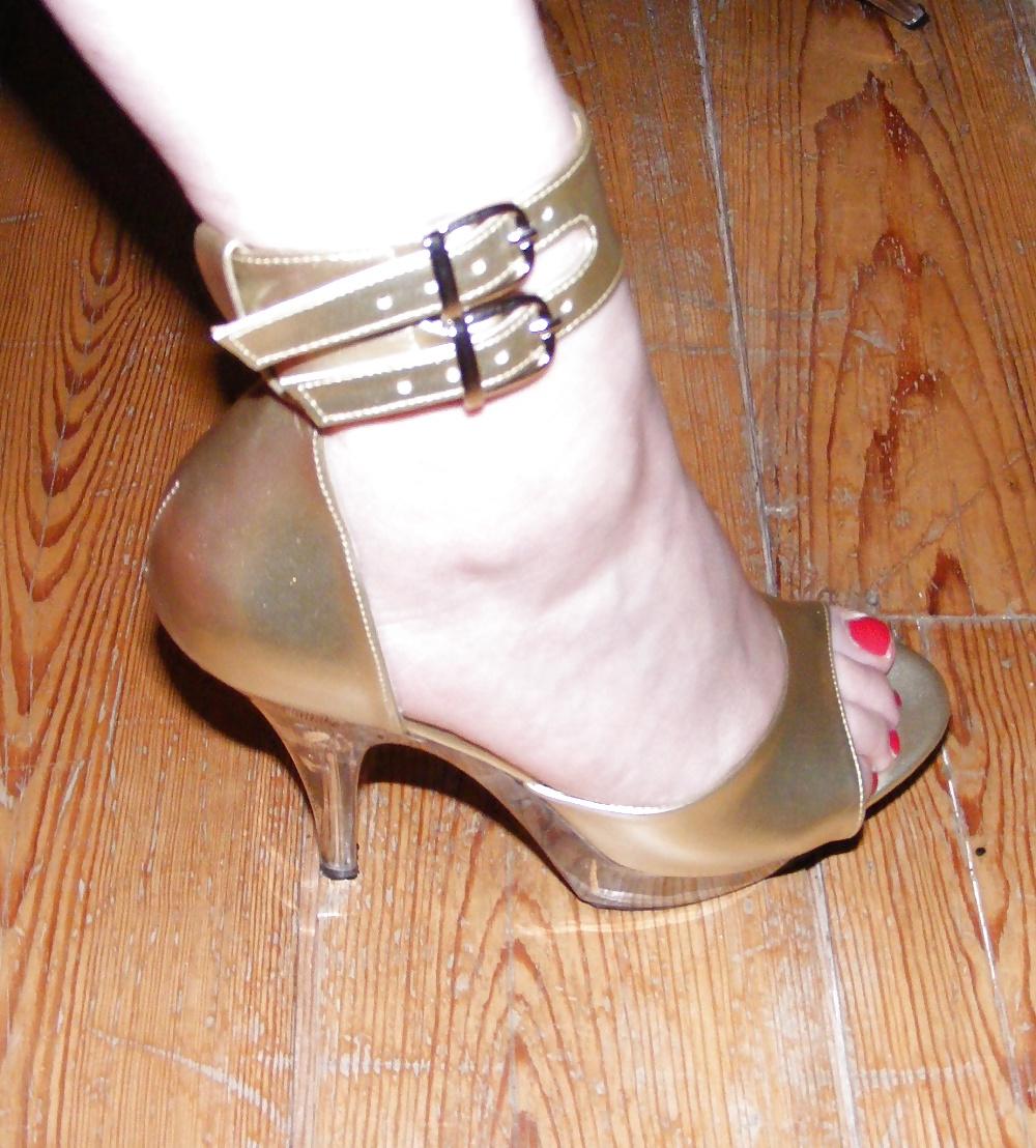 20P Gold hotpants and gold platform sandals
