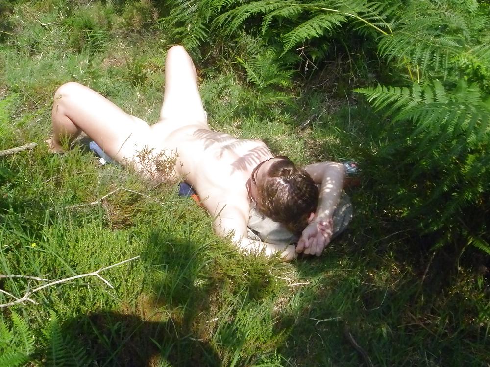 25P Outdoor couple playing in woods New forest dorset uk