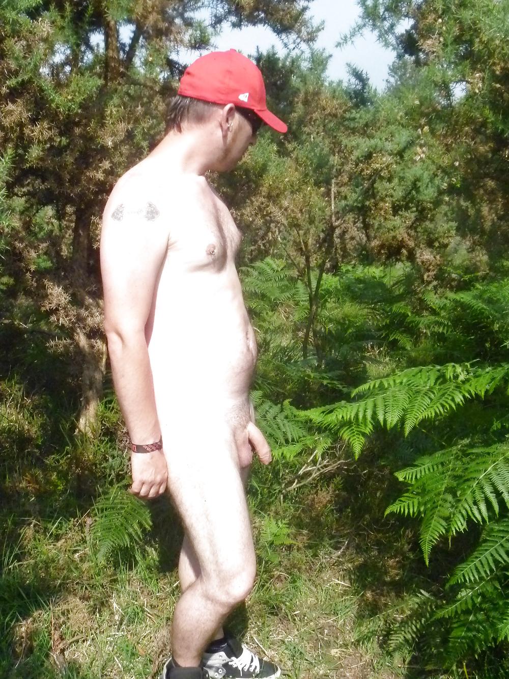 25P Outdoor couple playing in woods New forest dorset uk