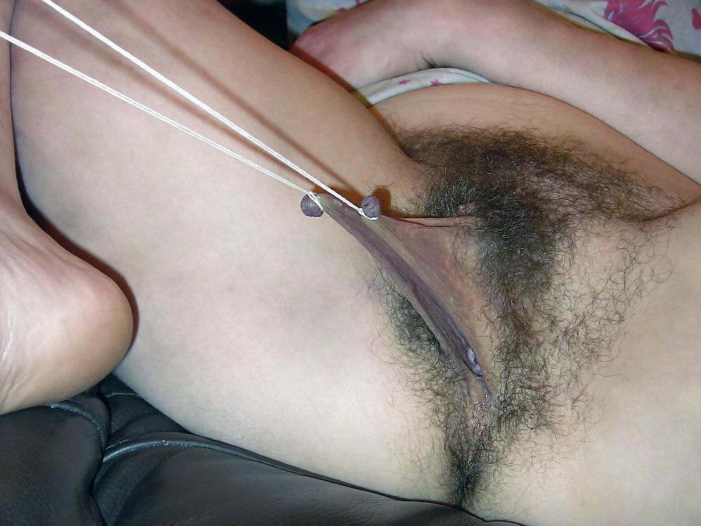 14P Tim 290 Stretching hairy pussy lips without the rings