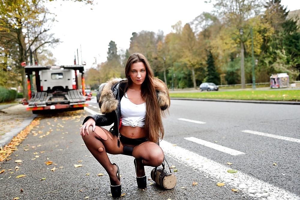 4P Street hooker. Real whore should walk in torn stockings