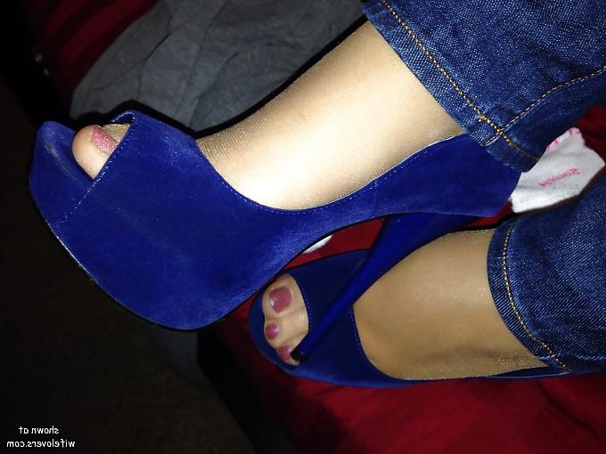 25P Some heels,shoe dangling