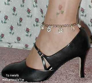 25P Some heels,shoe dangling