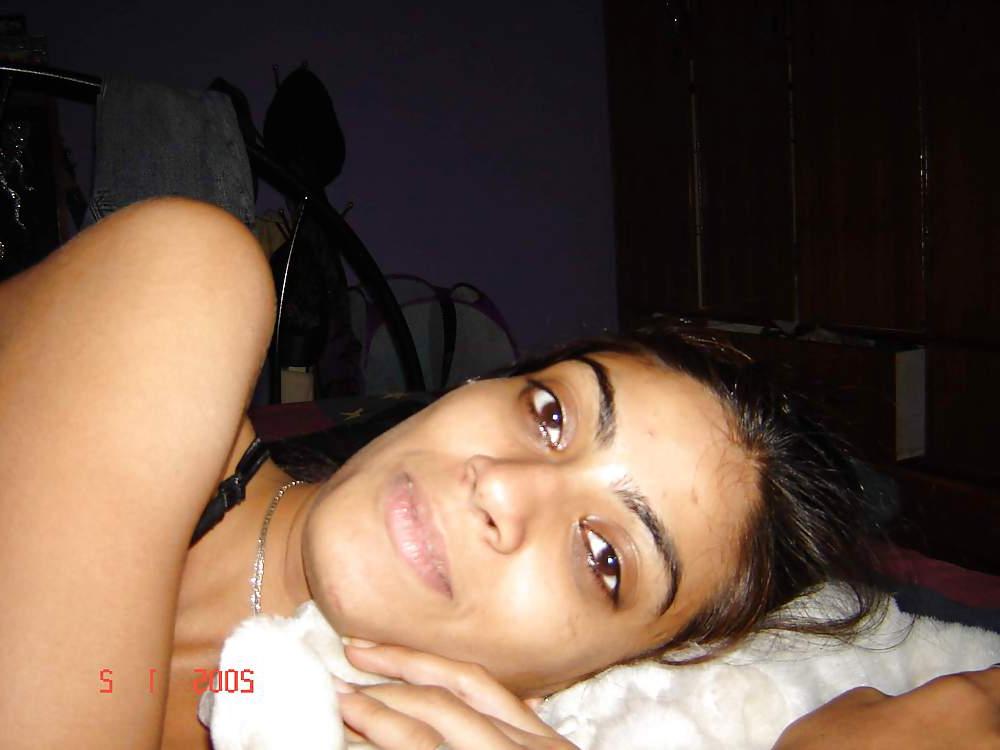 25P Young couple fooling around in bed