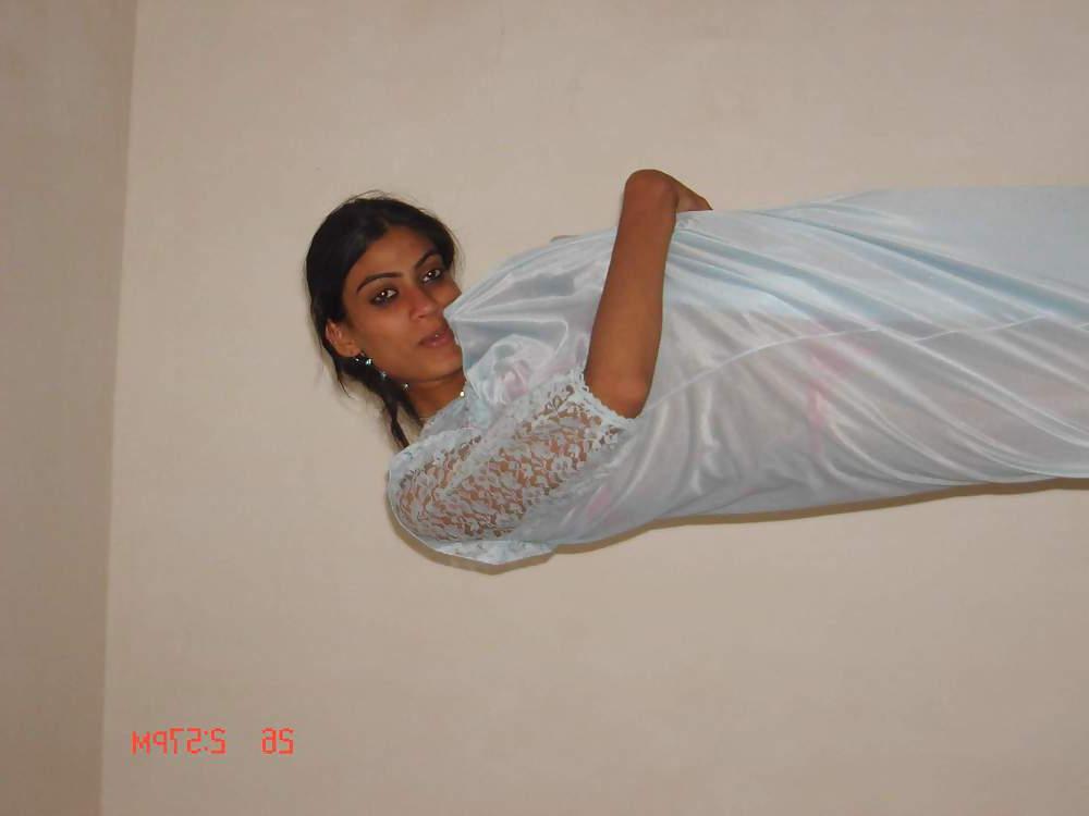 25P Young couple fooling around in bed