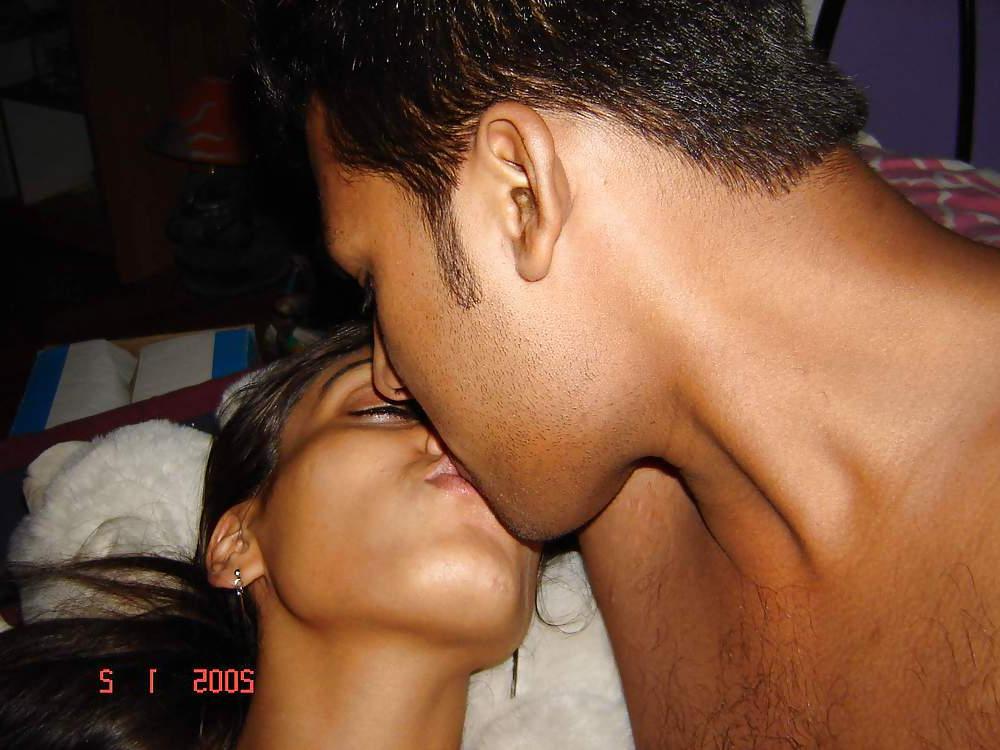 25P Young couple fooling around in bed