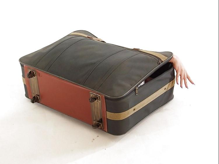 9P Girl in the Suitcase