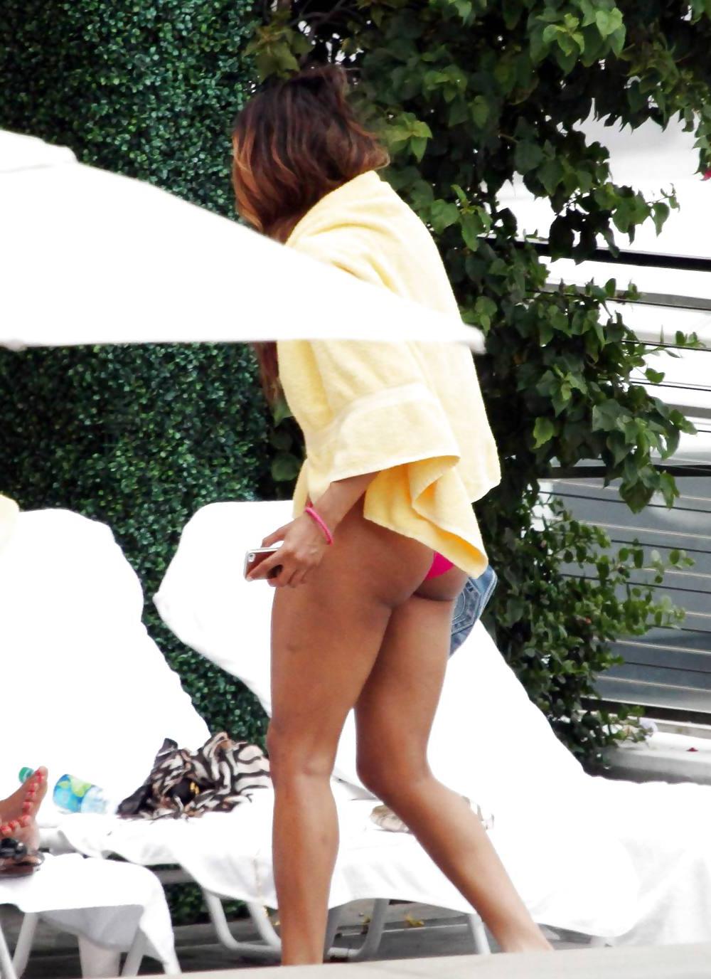 24P Ciara in a pink bikini poolside at her luxury hotel in Miami