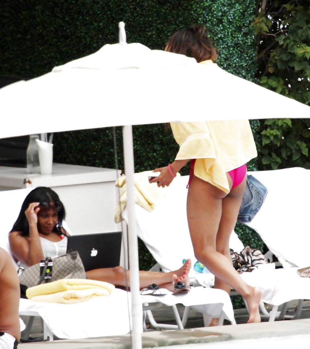 24P Ciara in a pink bikini poolside at her luxury hotel in Miami