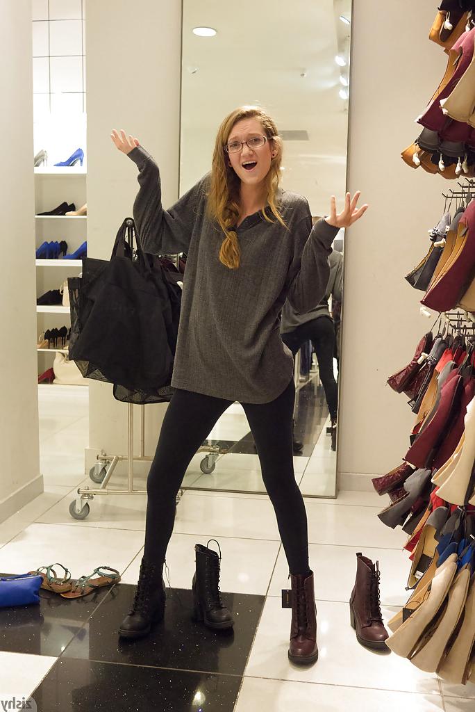 12P Skinny playful blonde teen Reese Berkman bending over in a store