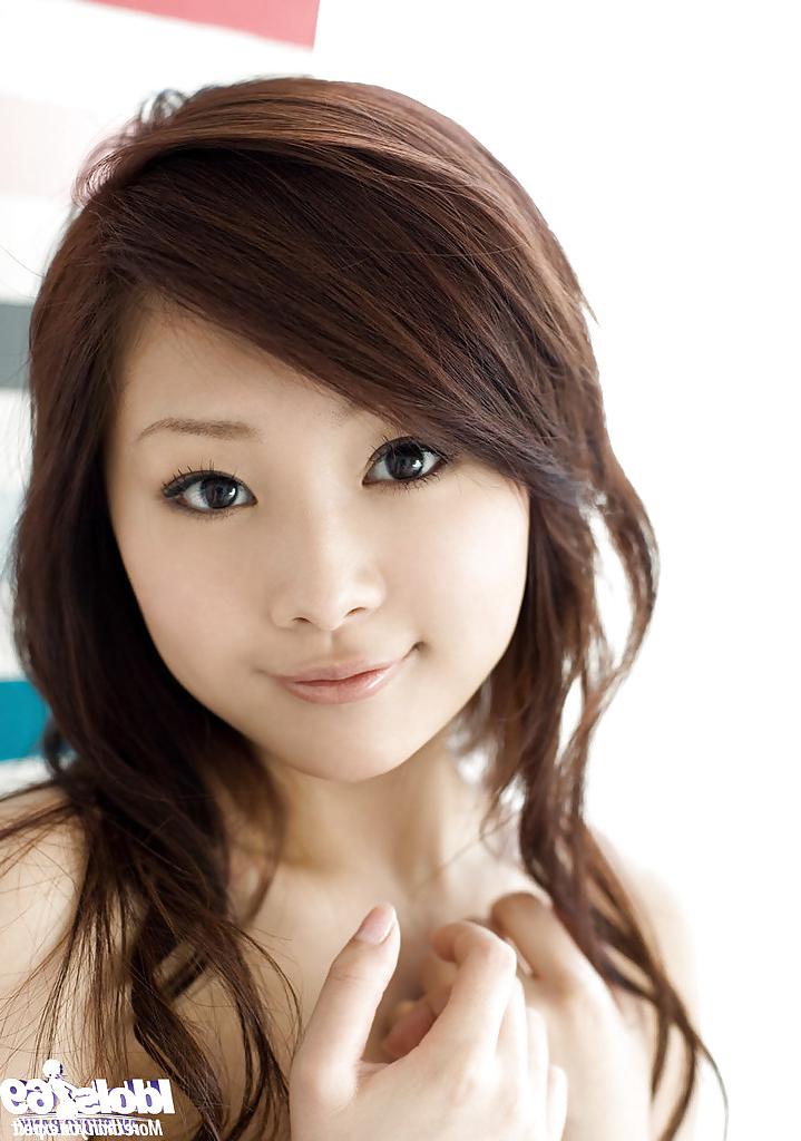 15P Seductive asian babe Suzuka Ishikawa slipping off her clothes