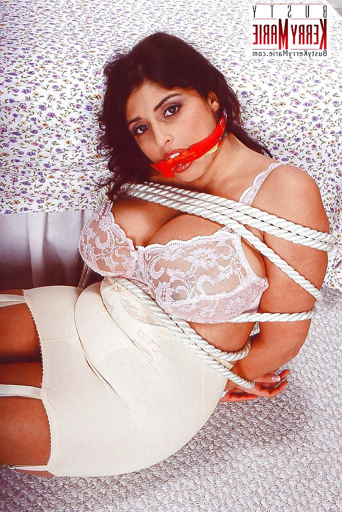16P Busty balled gagged Euro pornstar Kerry Marie undergoing BDSM session