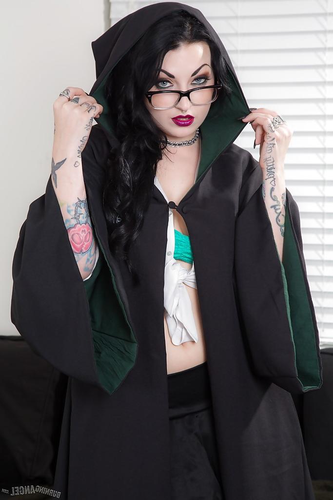 16P Tattooed goth chick strutting solo in pleated skirt and over the knee socks