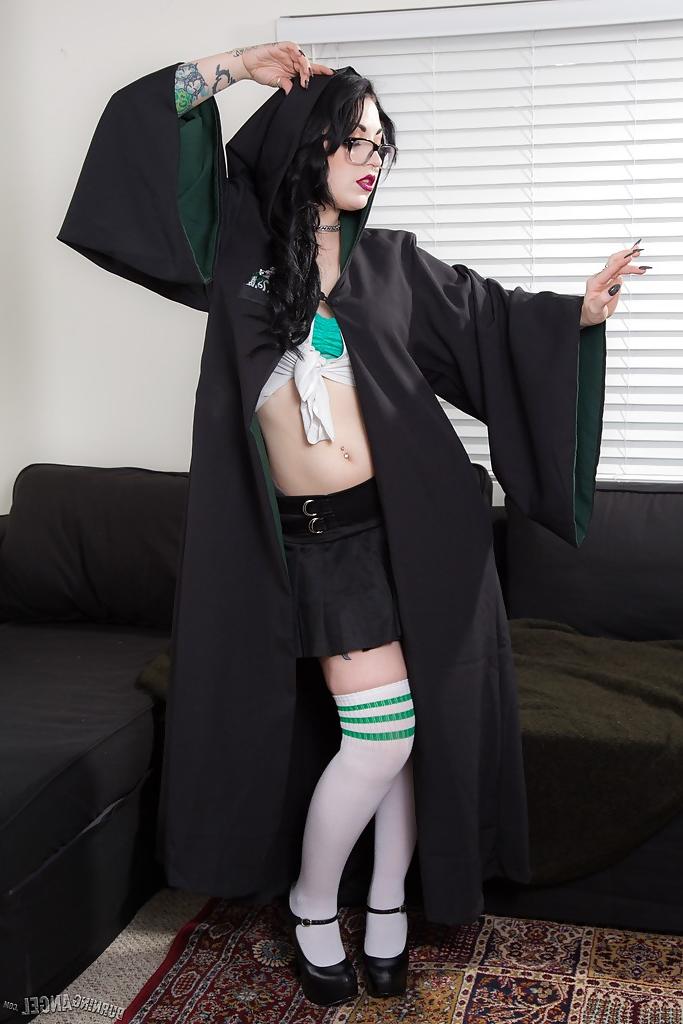 16P Tattooed goth chick strutting solo in pleated skirt and over the knee socks