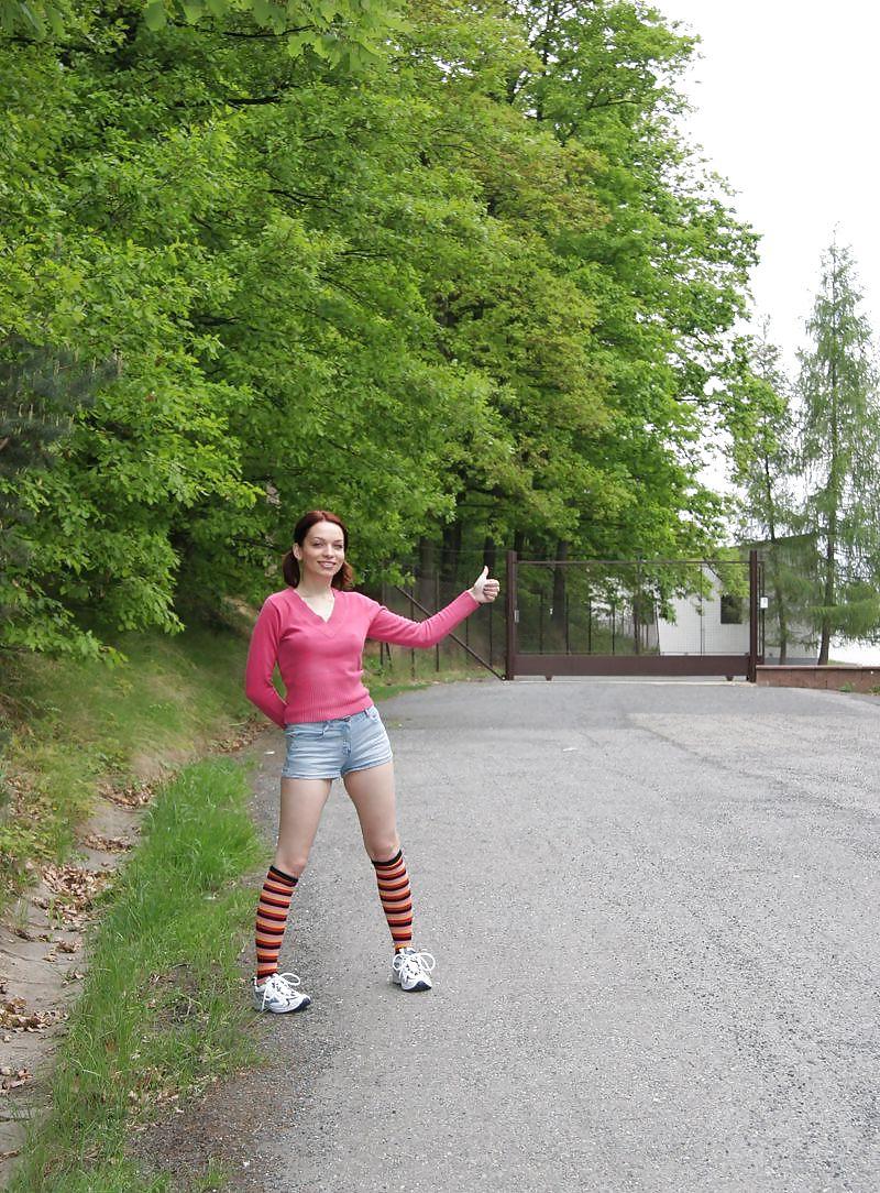 16P Brunett teen waits for a car