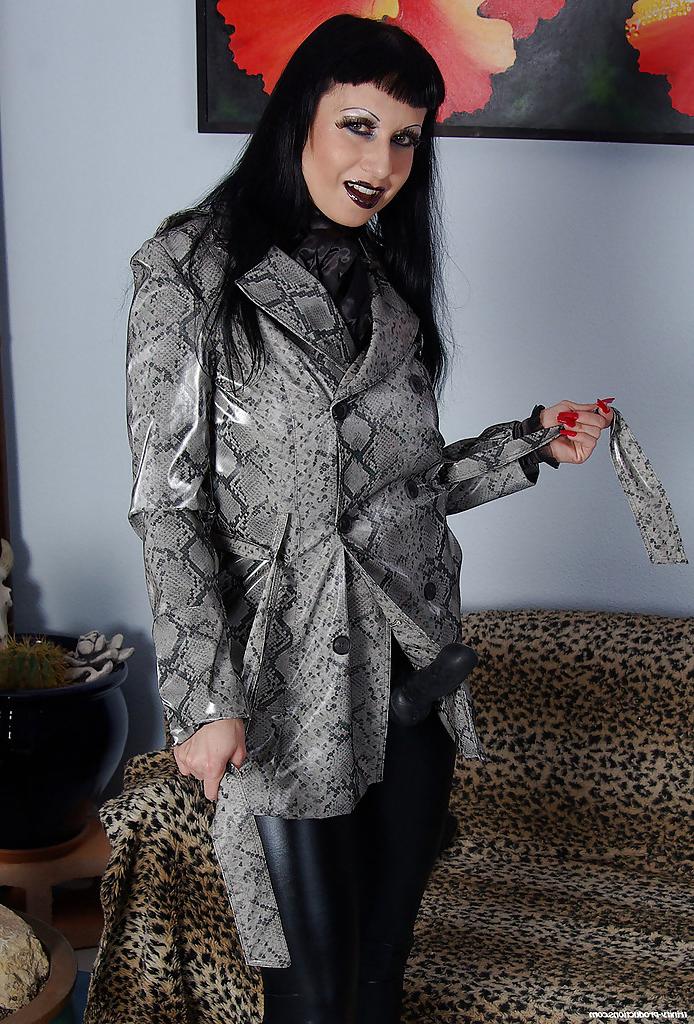 12P Seductive mature fetish babe posing with strapon over her latex leggings