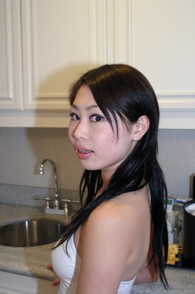 16P Brunette first timer slipping thong panties over phat Asian ass