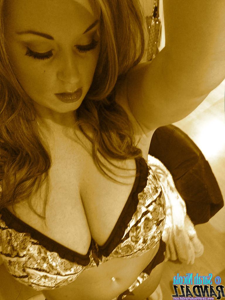 12P Big tit pornstar Sarah Nicola Randall taking topless homemade selfies