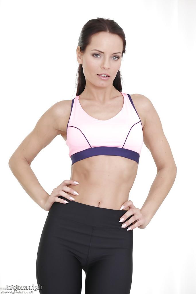 16P Fit Euro chick Kari peeling off spandex pants before playing with pussy