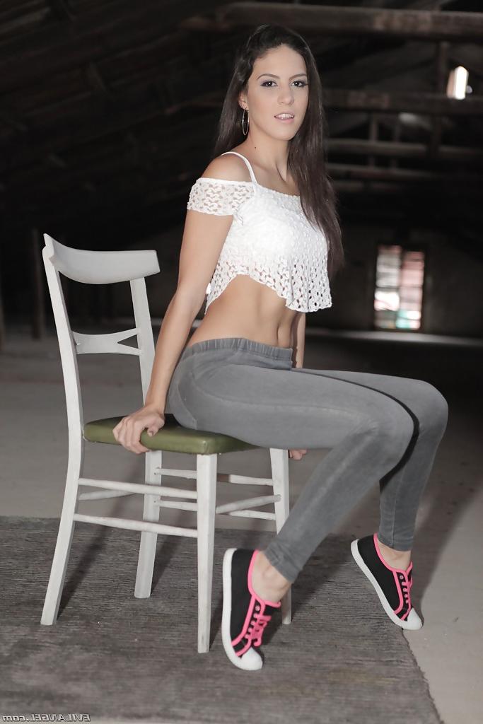 16P Brunette Euro babe Carolina Abril shedding yoga pants to pose for nude pics
