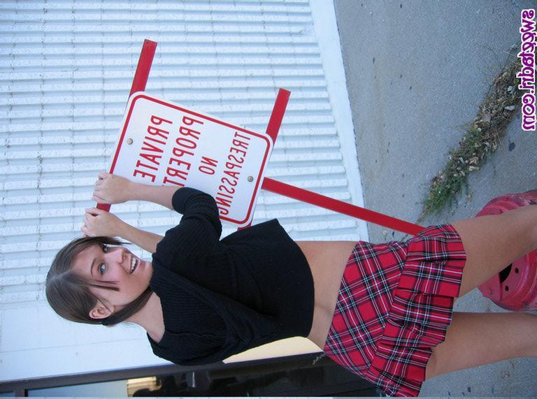 16P Adrienne on a car as a sexy slutty schoolgirl