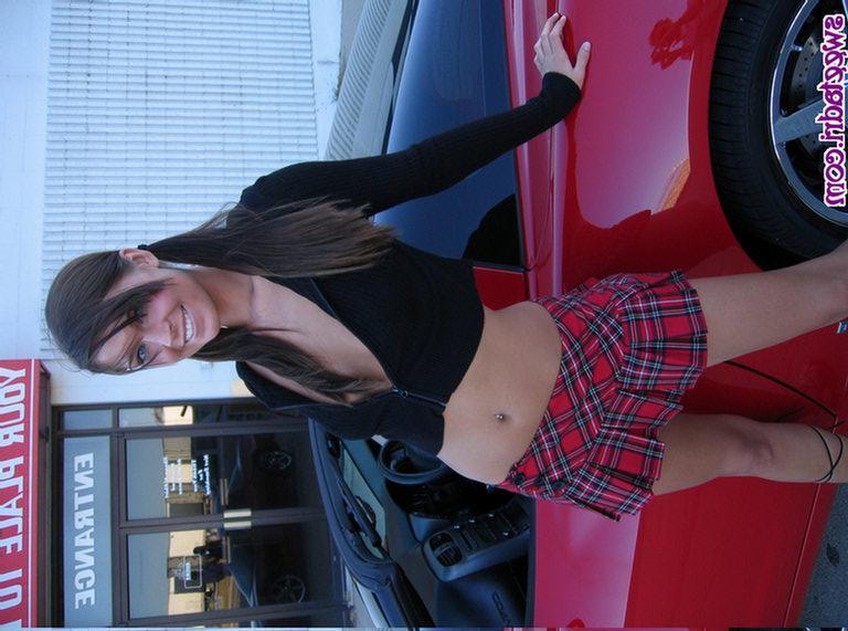 16P Adrienne on a car as a sexy slutty schoolgirl