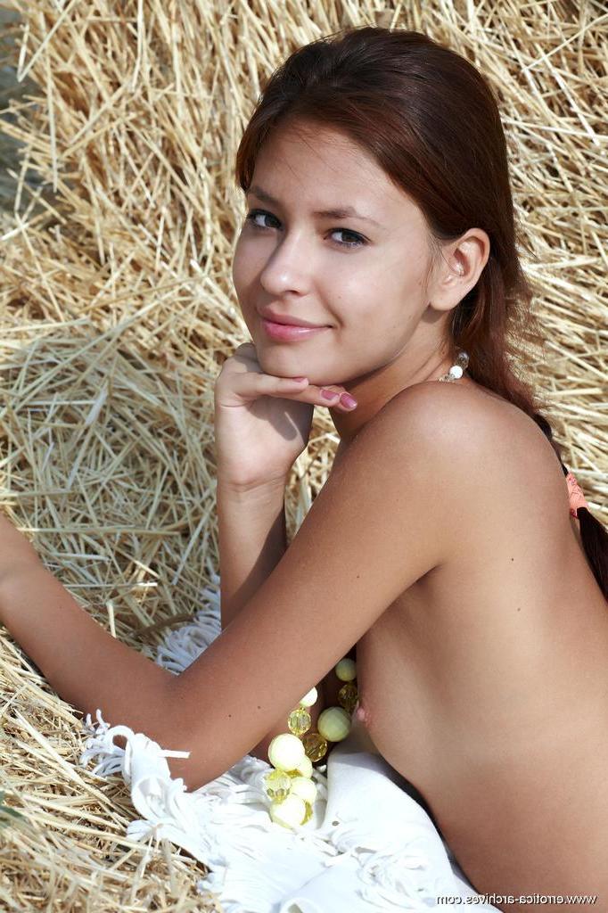 16P Brunette beauty Afrodita gets naked and rolls around in the hay