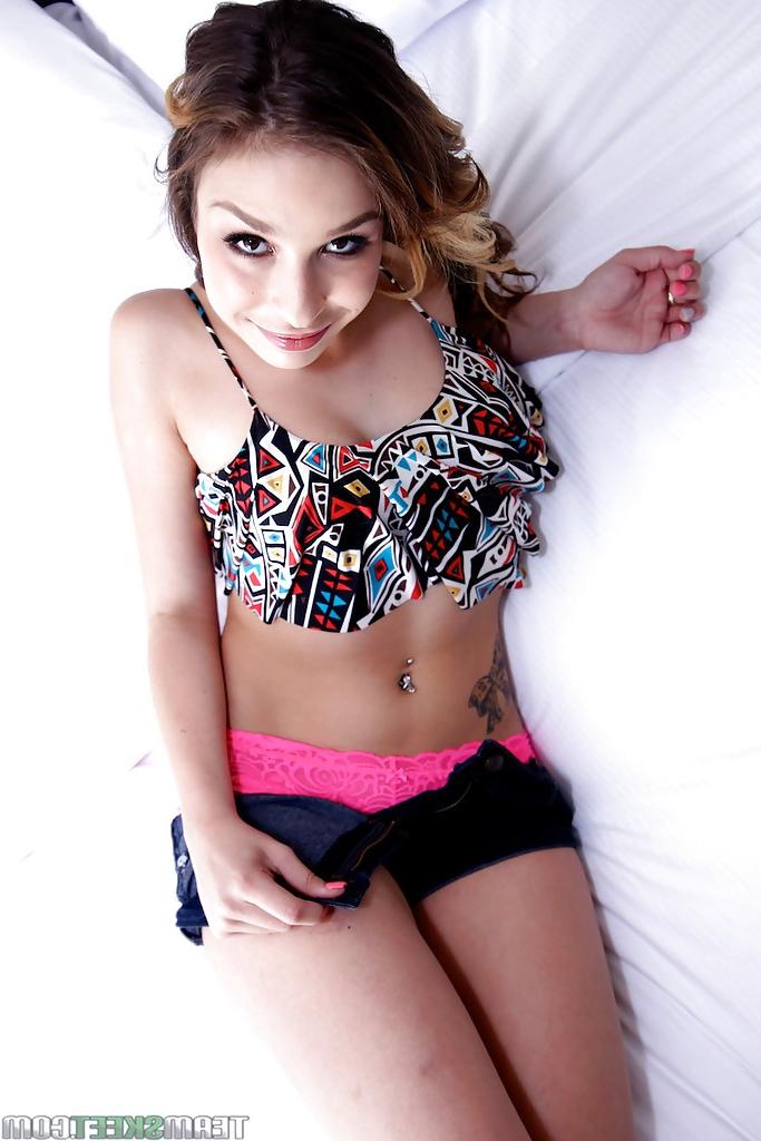 16P Sweet Latina babe Carmen Caliente is posing in tight shorts