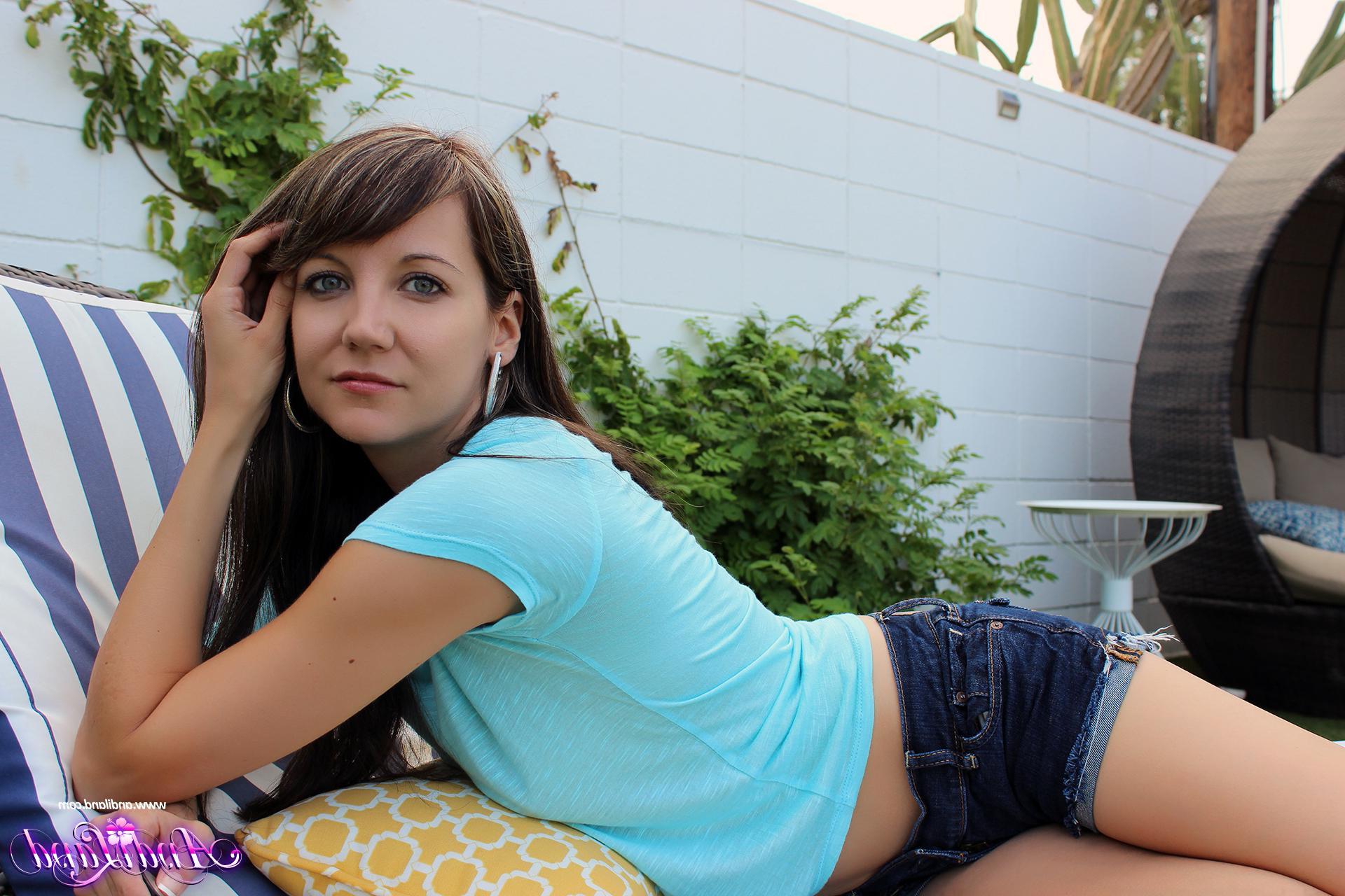 15P Andi Land pulls down her shorts to show you her tight pussy in "Bend Me Over"