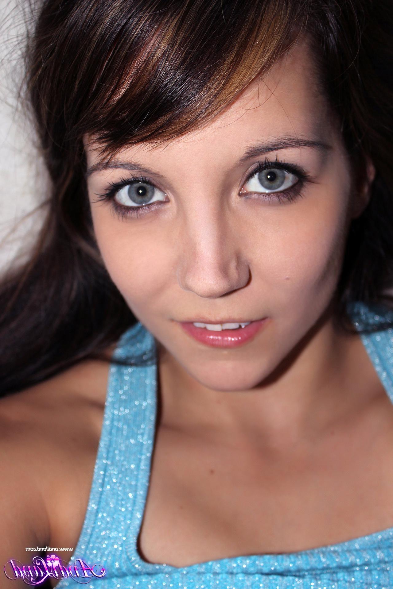 15P Andi Land strips and teases her tight asshole