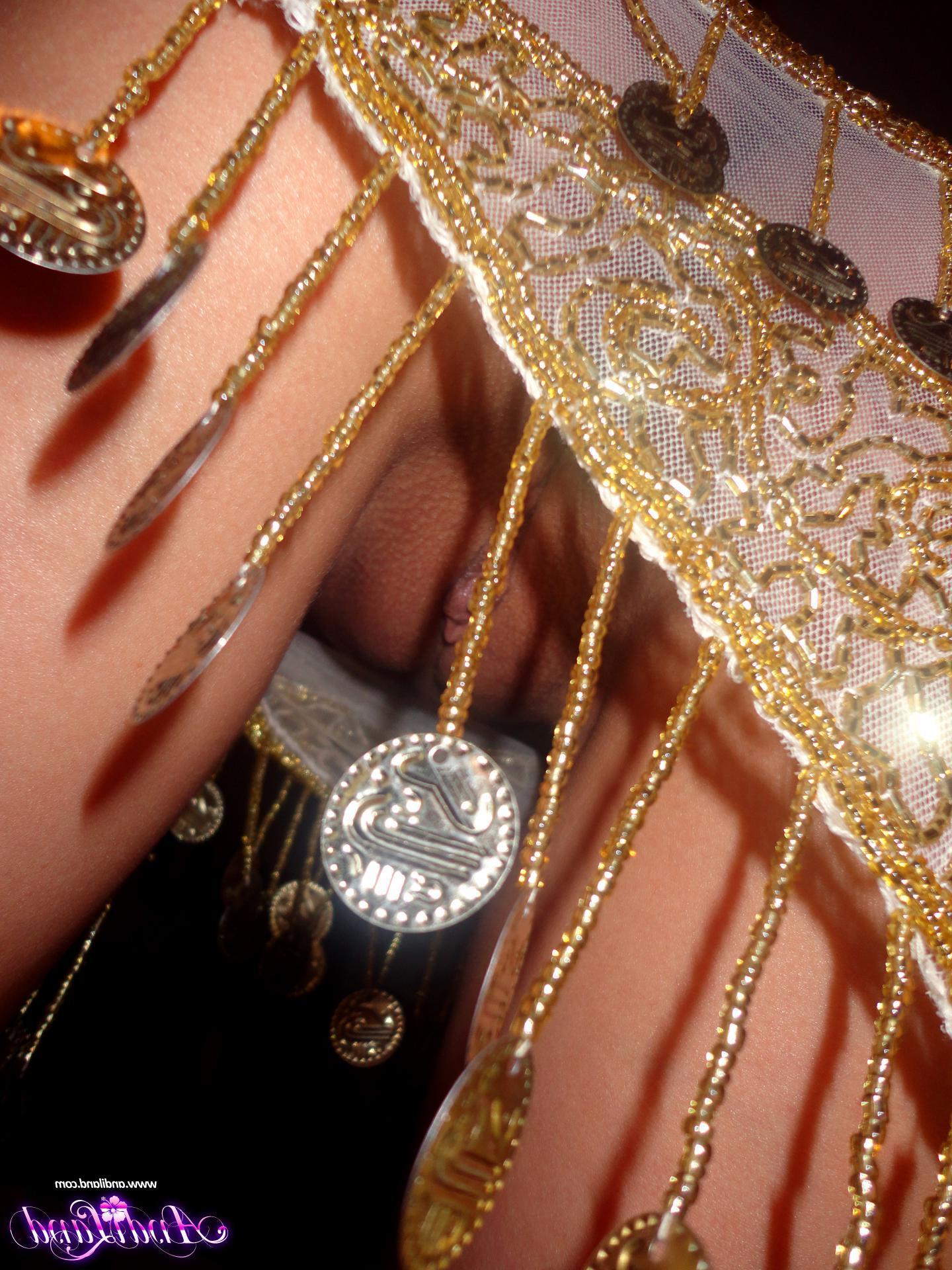 15P Pictures of Andi ready to have some fun in a hot belly dancer outfit