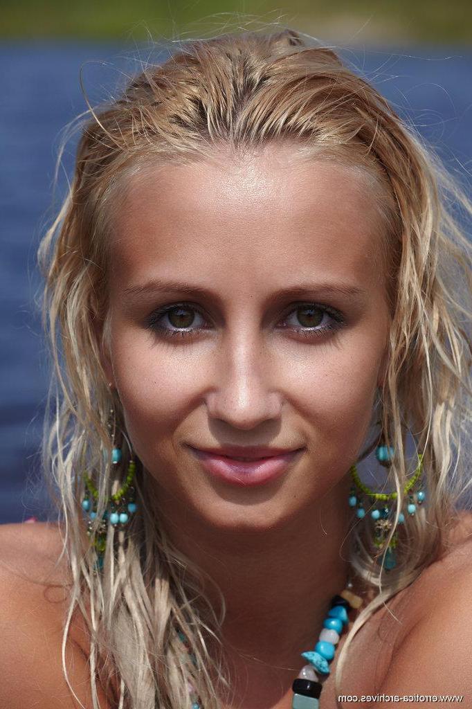 16P Afina flaunts her petite yet magnificently toned body with tight and firm assets as she sprawls on the sandy shore of the lake.