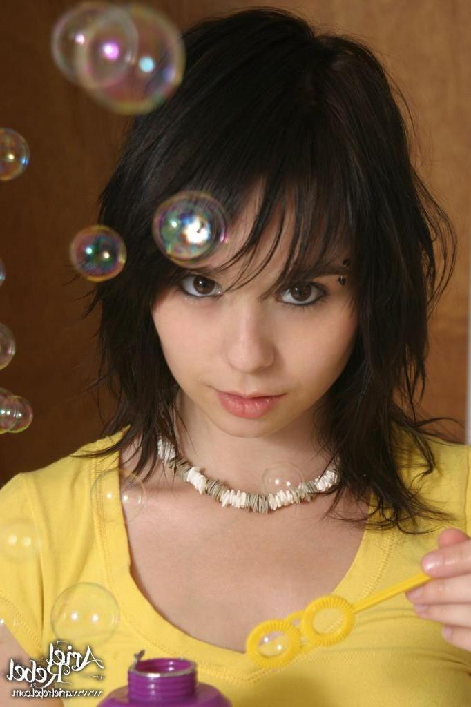 15P Pictures of Ariel Rebel showing her blowing skills