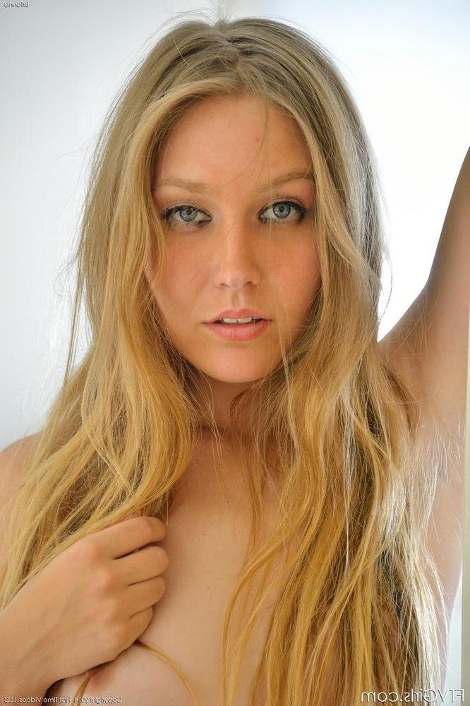 16P Beautiful girl Brianna bends over in sexy black stockings