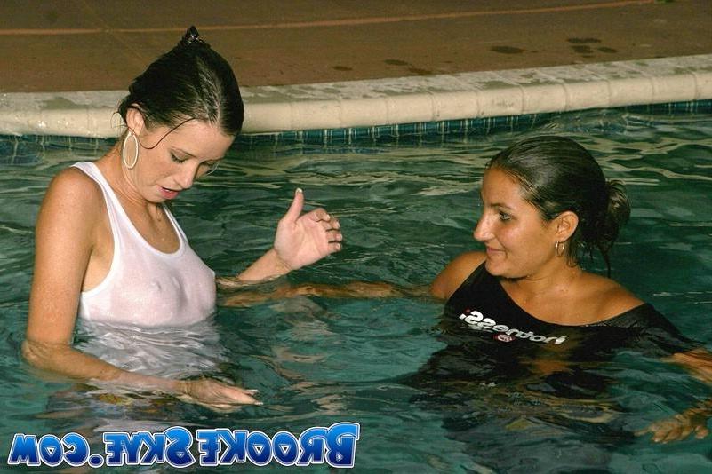 16P Brooke plays in the pool at night with a friend