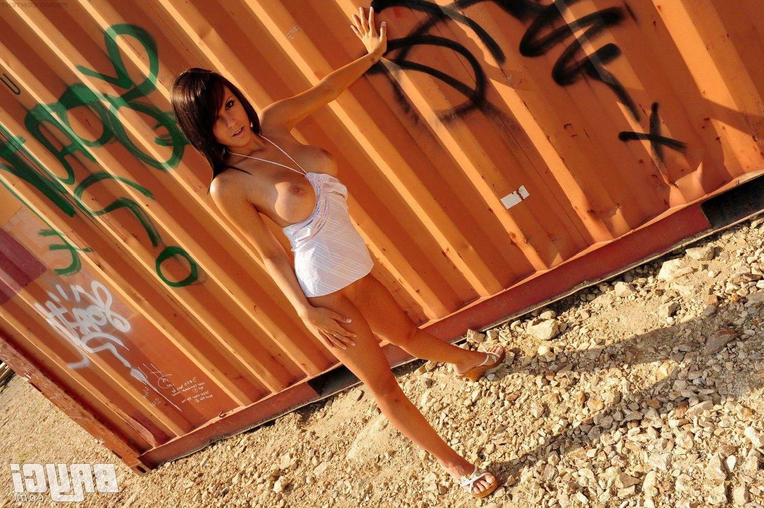 15P Pictures of Bryci exposing herself by a train car