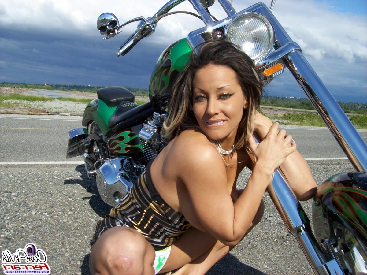 14P Pictures of teen babe Cam With Ferrari teasing on a motorcycle