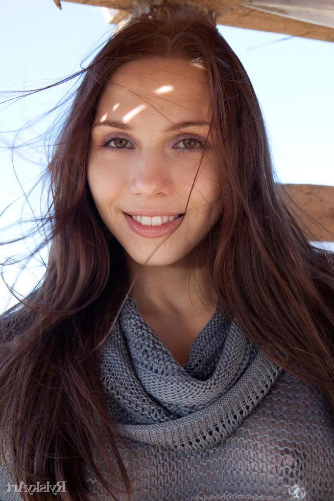 16P Gemma's natural beauty, carefree allure, and spontaneous personality stand out as she happily hangs out and poses in a shack by the beach.