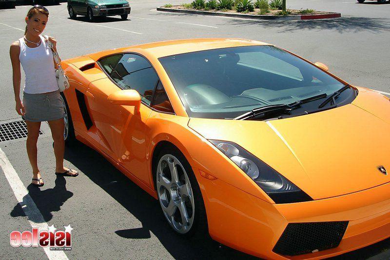 14P Pictures of teen girl Isis Lee showing her pussy in a sports car