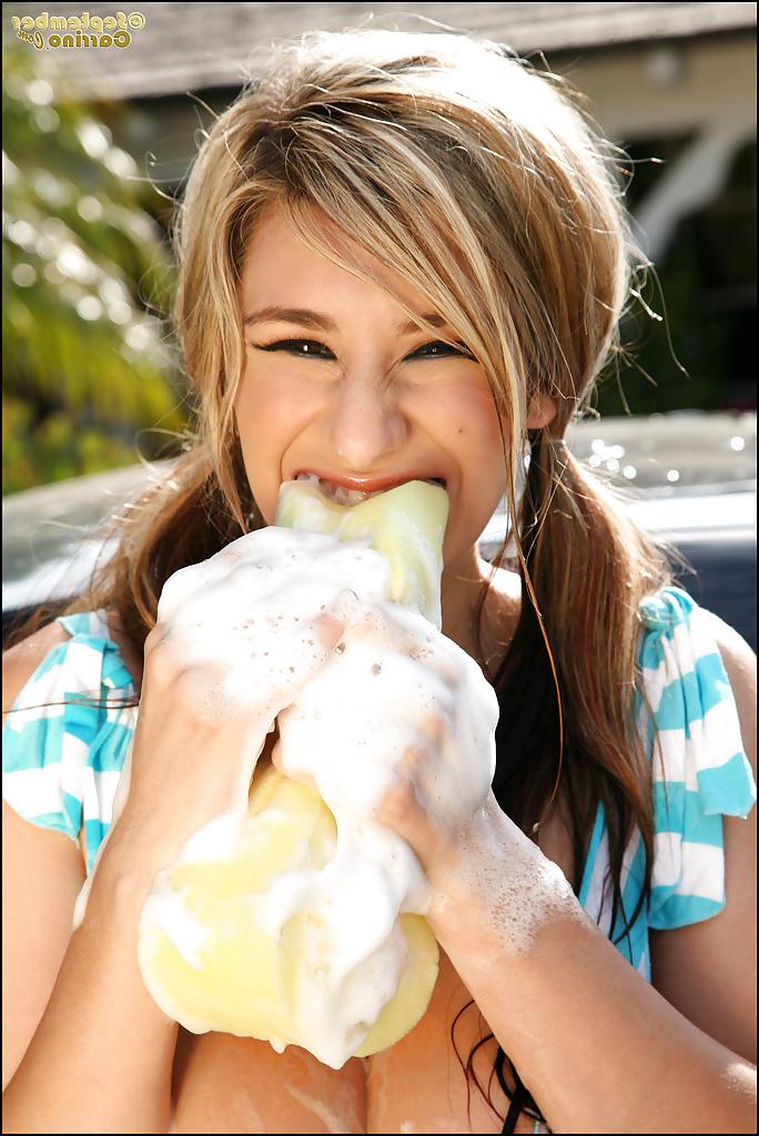 16P Busty babe September Carrino washes her car and exposing her boobs