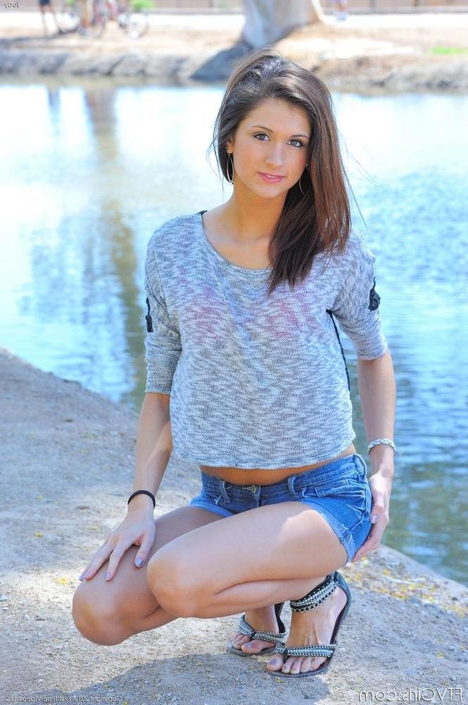 16P Beautiful skinny teen Jody strips naked outdoors