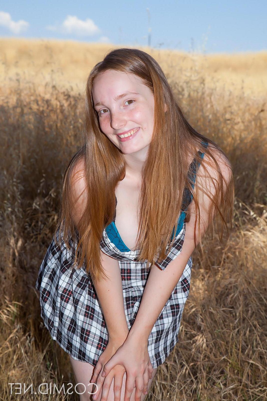 16P Beautiful redhead Julia Fleming invites you into her field of dreams