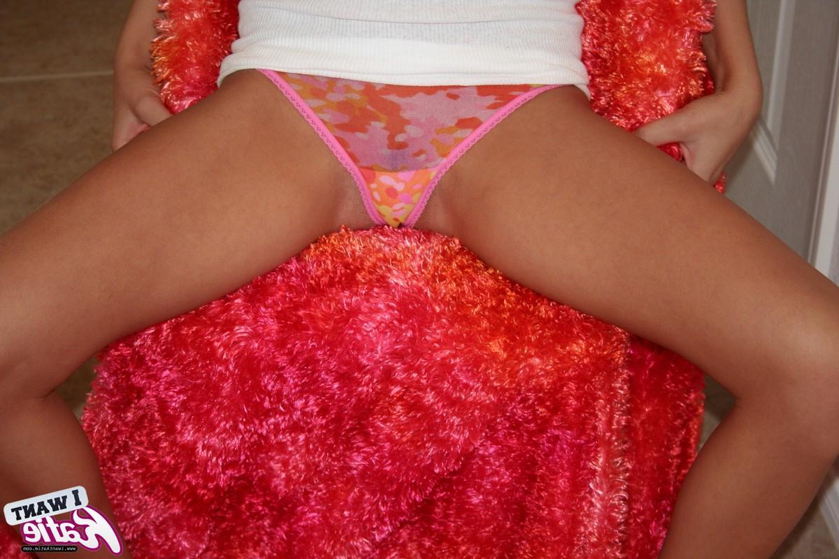 12P Katie pulls down her tiny thong and exposes her perfect teenage pussy that just begs for you