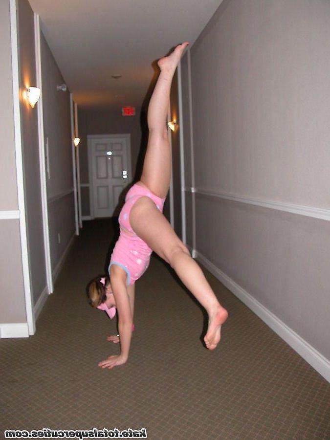 20P Pictures of teen cutie Katie being a tease in a hotel hallway