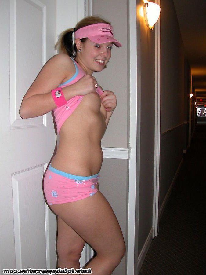 20P Pictures of teen cutie Katie being a tease in a hotel hallway