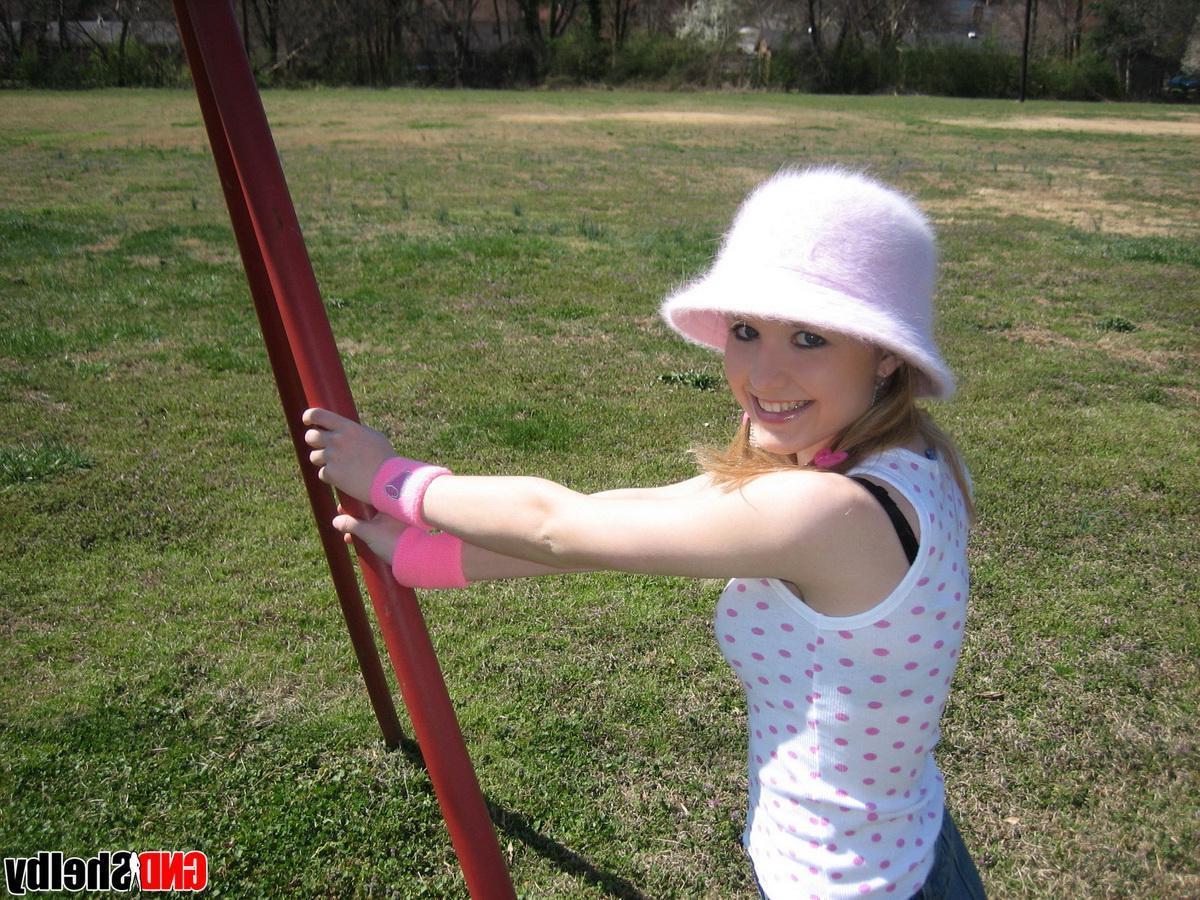 12P Teen girl Shelby teases with her perky perfect tits at the playground
